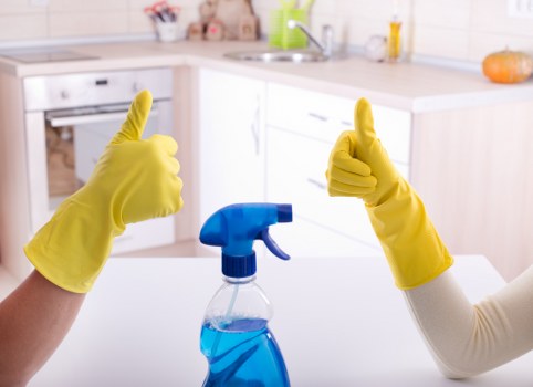Carpet cleaner preparing equipment safely in an Ilford home