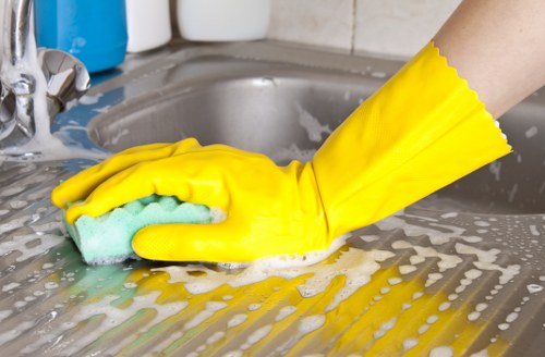 Local cleaning service preparing a tidy bedroom in Ilford